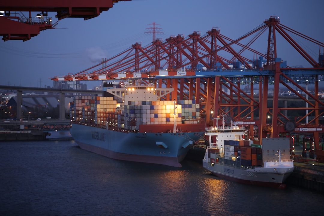 The Art of Drawing Readers In: Your attractive post title goes here blue-and-red-cargo-ship-on-sea-during-daytime-vuvscjagrqu